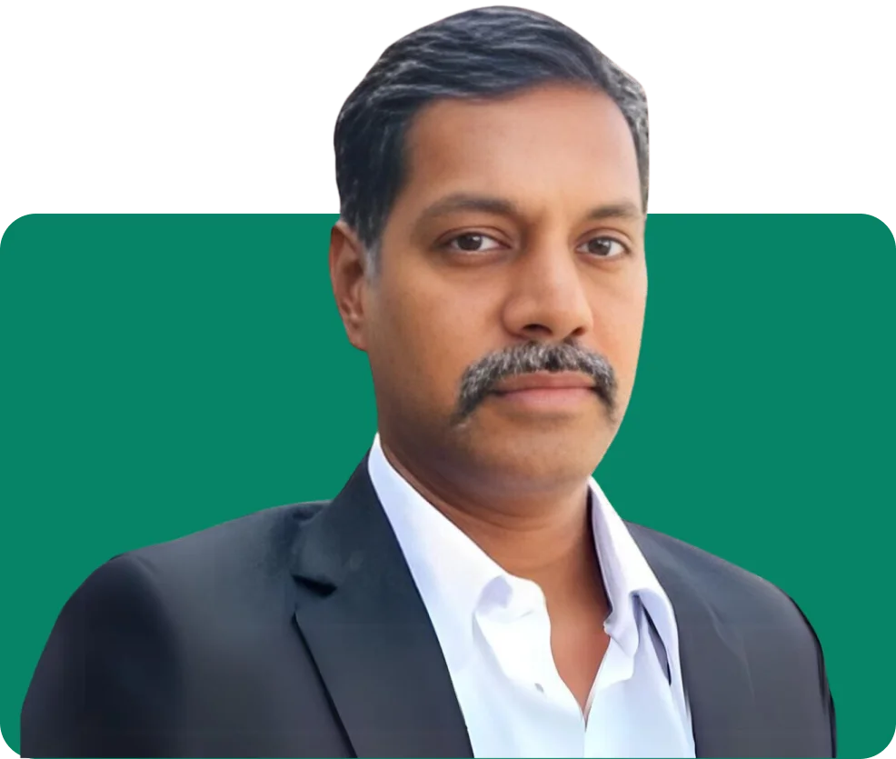 Professional man in a suit with a mustache, representing leadership on the About Us page.